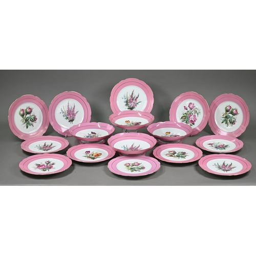 601 - A Victorian china fruit service with floral specimen painted centres with pink and gilt borders, com... 