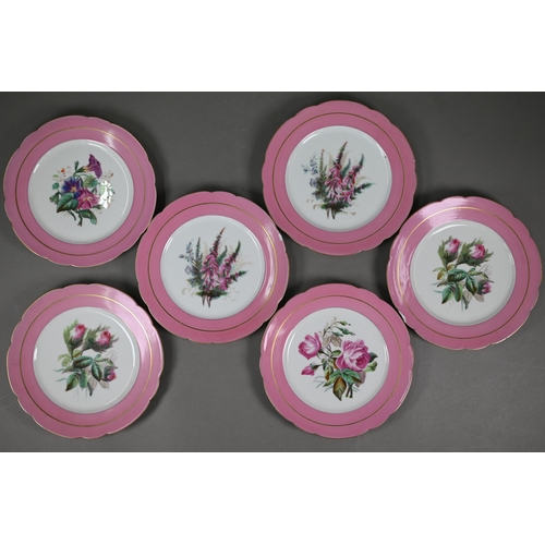 601 - A Victorian china fruit service with floral specimen painted centres with pink and gilt borders, com... 