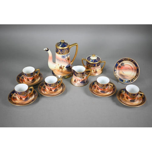 607 - A Noritake china coffee service, painted with dessert oasis scenes, comprising coffee pot, cream and... 