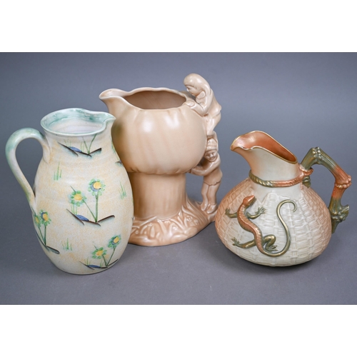 609 - An Edwardian Royal Worcester blush-ground jug moulded with basket-work and mounted with a gilt lizar... 