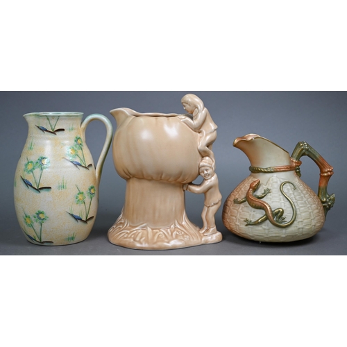 609 - An Edwardian Royal Worcester blush-ground jug moulded with basket-work and mounted with a gilt lizar... 