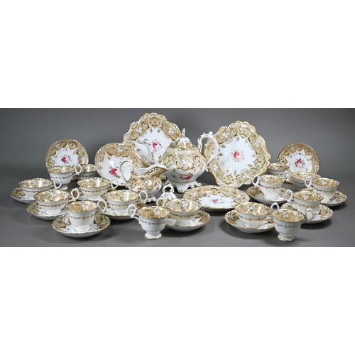 610 - A Victorian china tea service, painted with roses within a beige and gilt border, comprising a teapo... 