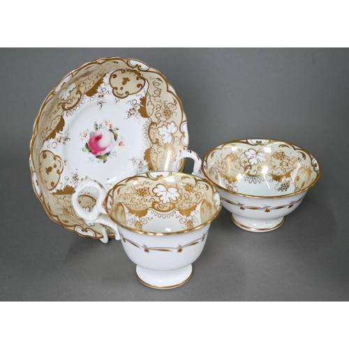 610 - A Victorian china tea service, painted with roses within a beige and gilt border, comprising a teapo... 