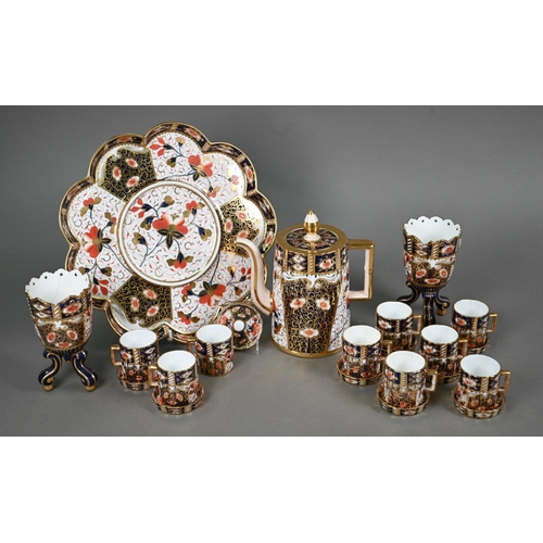 612 - A Victorian Davenport Imari pattern coffee pot and nine coffee cans and saucers on a fitted tray to/... 