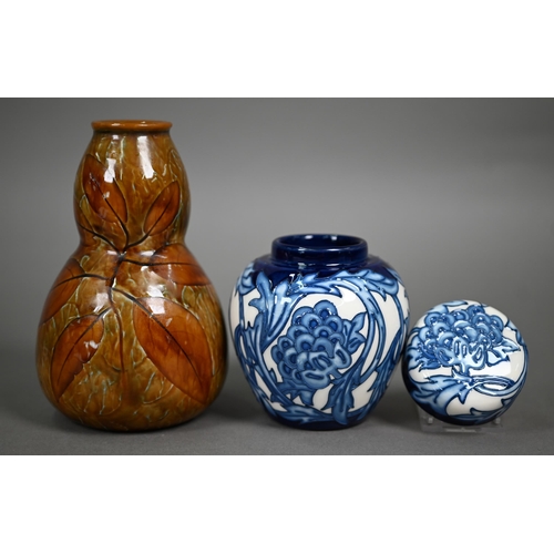 619 - A Moorcroft Kelmscott Artichoke ginger jar and cover, 11 cm, to/w a Royal Doulton stoneware Autumn L... 