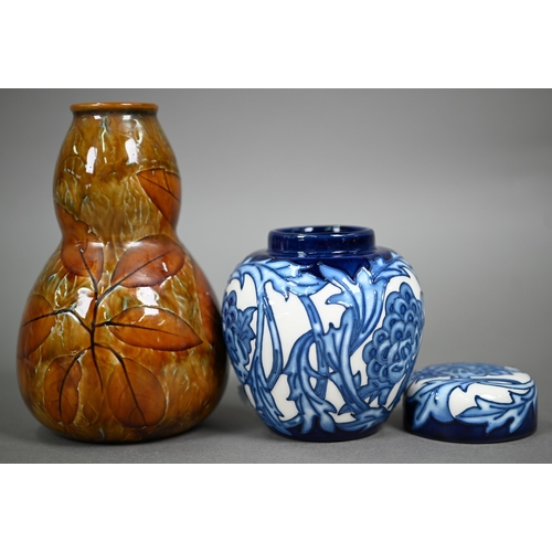 619 - A Moorcroft Kelmscott Artichoke ginger jar and cover, 11 cm, to/w a Royal Doulton stoneware Autumn L... 