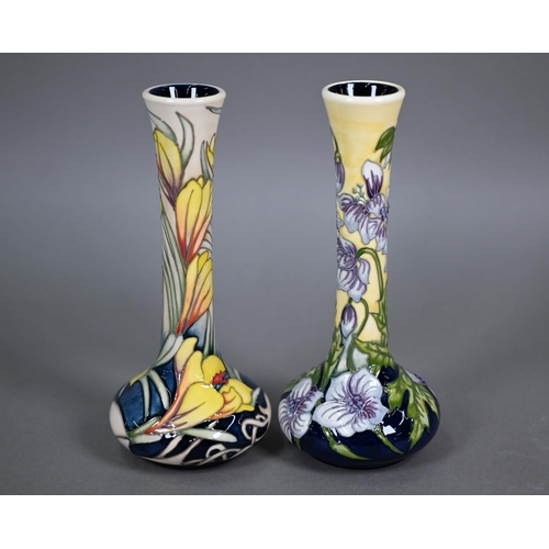 622 - Two Moorcroft floral-design onion-shaped vases, 20 cm