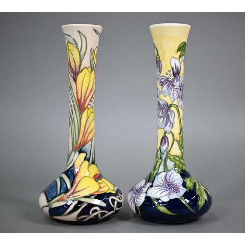 622 - Two Moorcroft floral-design onion-shaped vases, 20 cm