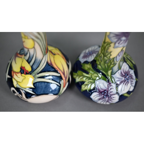 622 - Two Moorcroft floral-design onion-shaped vases, 20 cm