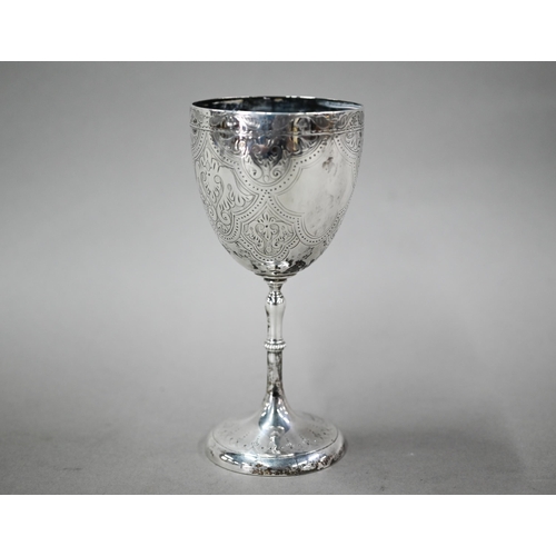 63 - A Victorian silver goblet with engraved decoration, maker CH, London 1864, 4.5oz, 15cm high