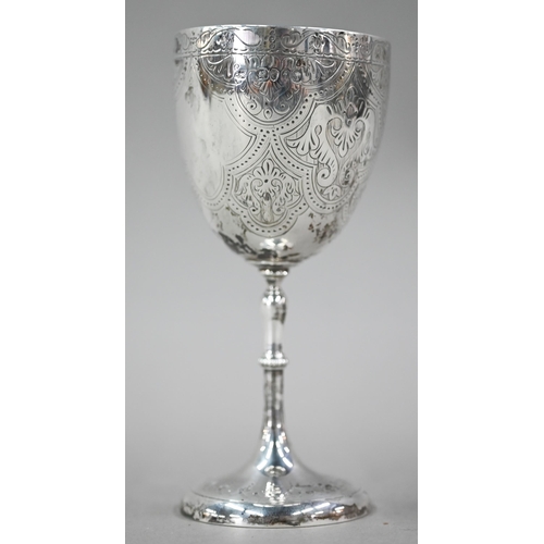 63 - A Victorian silver goblet with engraved decoration, maker CH, London 1864, 4.5oz, 15cm high