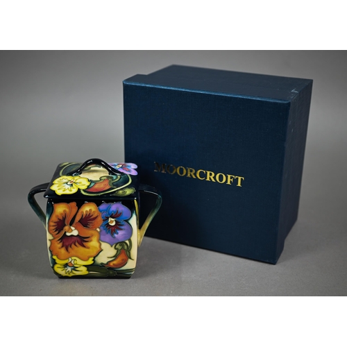 635 - A boxed Moorcroft 'Tangerine Pansy' two-handled box and cover, ltd ed 50/150, by Emma Bossons, 14.5 ... 