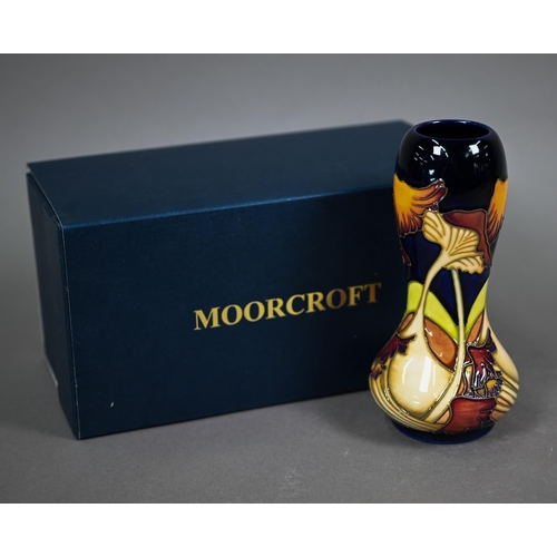 637 - A boxed Moorcroft 'Parasol Dance' waisted vase by Kerry Goodwin, 15.5 cm 