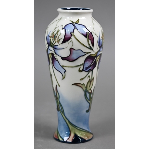 640 - A boxed Moorcroft 'Petals in the Wind' vase by Nicola Slaney, 20.5 cm high