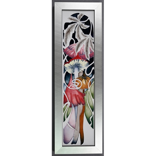 650 - A boxed Moorcroft 'Waxcup Wonders' plaque by Vicky Lovatt 2012, 40 x 9.5 cm, in oak frame