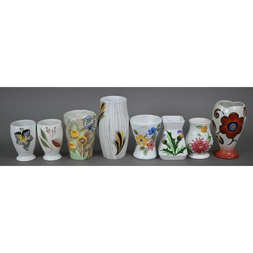 656 - A quantity of E Radford floral-painted vases and jugs, to/w two albums of The ETB Radford Collectors... 