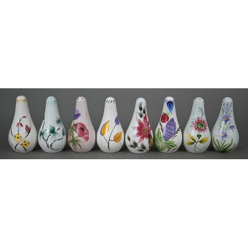 658 - A selection of E Radford floral-painted condiments, including salts, peppers and oil-ewers, to/w oth... 