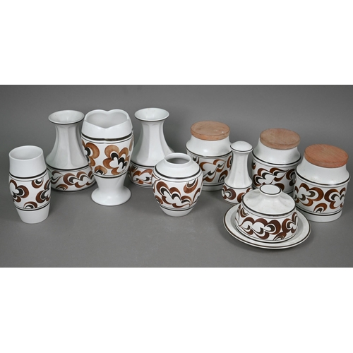 661 - A set of E Radford vases, storage jars and cheese dish with stylised cloud decoration, to/w five pie... 