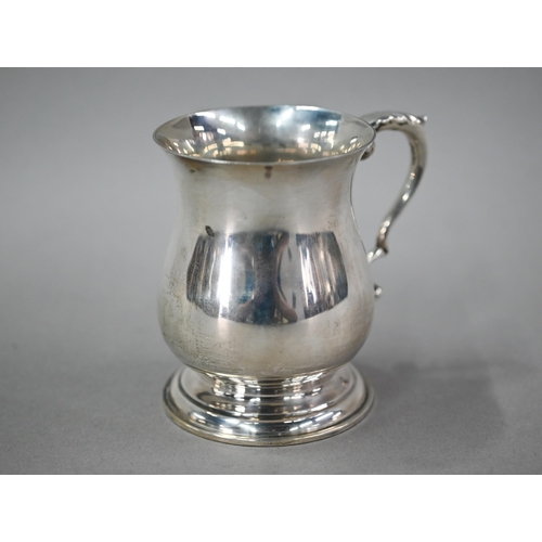 69 - A small silver baluster mug in the Georgian taste, Francis Howard Ltd, Sheffield 1968, 7oz, 9.5cm hi... 