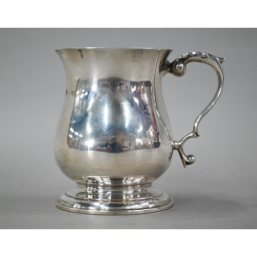 69 - A small silver baluster mug in the Georgian taste, Francis Howard Ltd, Sheffield 1968, 7oz, 9.5cm hi... 