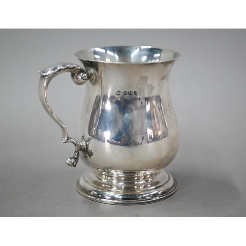 69 - A small silver baluster mug in the Georgian taste, Francis Howard Ltd, Sheffield 1968, 7oz, 9.5cm hi... 