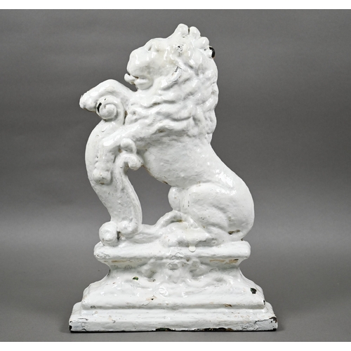 70 - A cast iron Victorian door stop modelled as a lion rampant, painted white, 37 cm