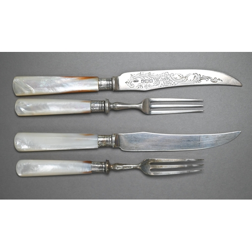 71 - An Edwardian oak-cased set of twelve each silver dessert knives and forks with engraved blades and m... 