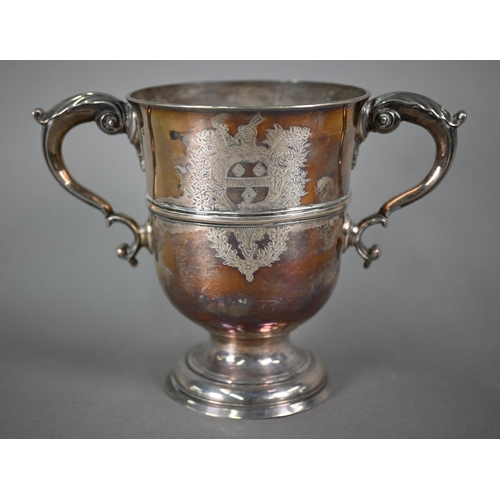 72 - A Georgian unmarked silver loving cup with twin scroll handles, on stemmed foot, makers mark only WT... 