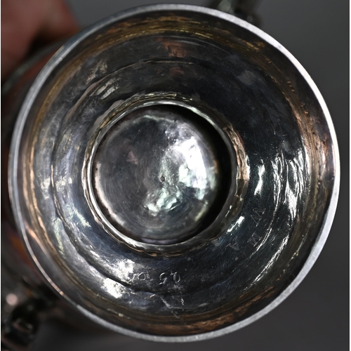 72 - A Georgian unmarked silver loving cup with twin scroll handles, on stemmed foot, makers mark only WT... 