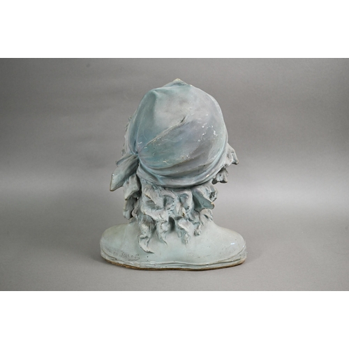 75 - An Art Nouveau head and shoulder ceramic bust of a young girl, modelled with cap and ringlets, later... 