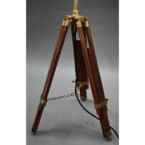 80 - A mid-20th century wooden and brass telescopic tripod converted to a table lamp, with an off-white c... 