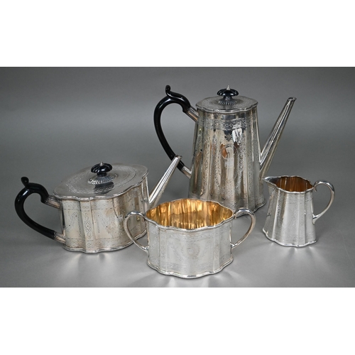 99 - A Victorian engraved silver four-piece tea/coffee service with ebonised handles and finials, Henry H... 