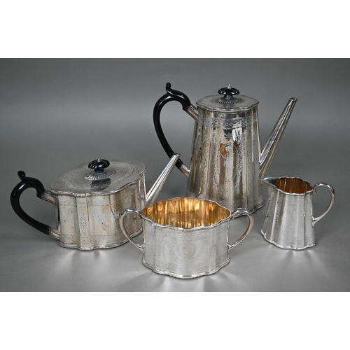 99 - A Victorian engraved silver four-piece tea/coffee service with ebonised handles and finials, Henry H... 