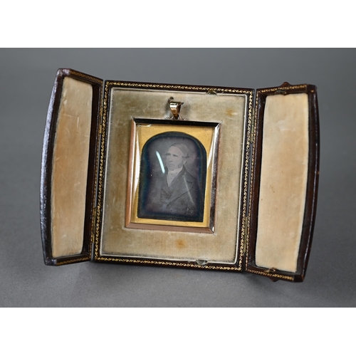 1041 - Manner of Richard Beard - A daguerrotype photographic portrait of a gentleman, in gilt metal frame a... 