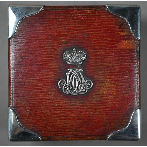 1072 - A late Victorian silver-mounted and red morocco-bound case, the cover with crowned cypher of Princes... 