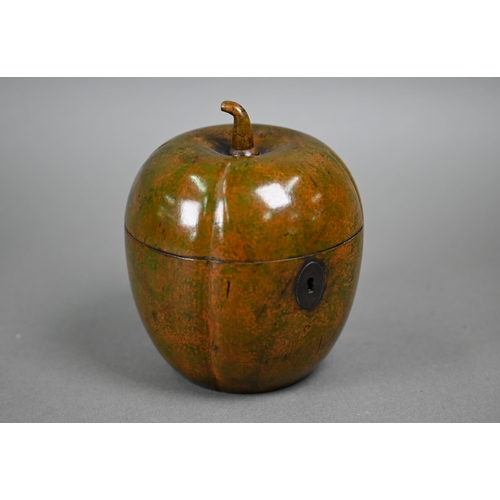 1081 - A turned and carved wood tea caddy in the form of a melon, 12.5 cm high