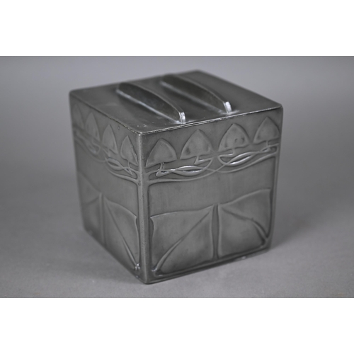 1082 - An Art Nouveau pewter biscuit box and cover of cube form with embossed stylised foliage, in the mann... 