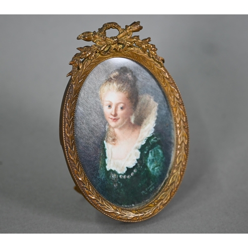 1084 - An early 20th century oval portrait miniature on ivory of a young lady in 17th century costume, sign... 