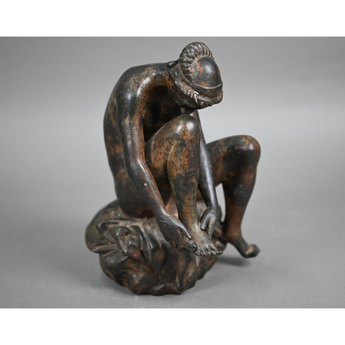 1102 - A patinated bronze nude study of a bather, unsigned, 21.5 cm high, after a renaissance bronze in the... 