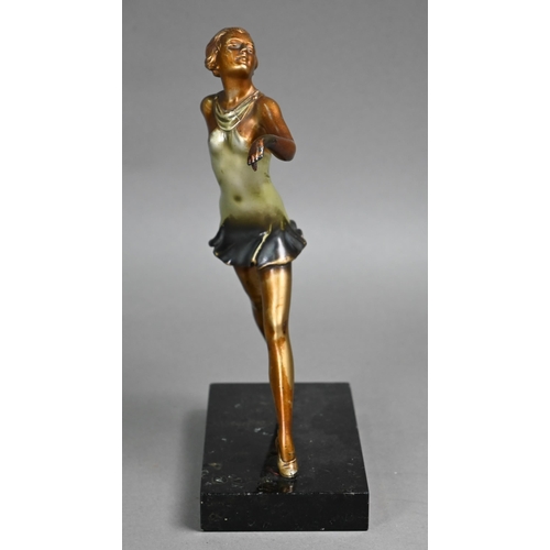 1104 - An Art Deco gold-patinated bronze figure of a striding girl in the manner of Lorenzl (unsigned), 21.... 