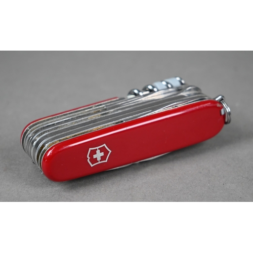 1123 - A boxed Victorinox 'Swiss Champ' Swiss Army penknife with 31 functions, to/w a boxed Kershaw pocket-... 