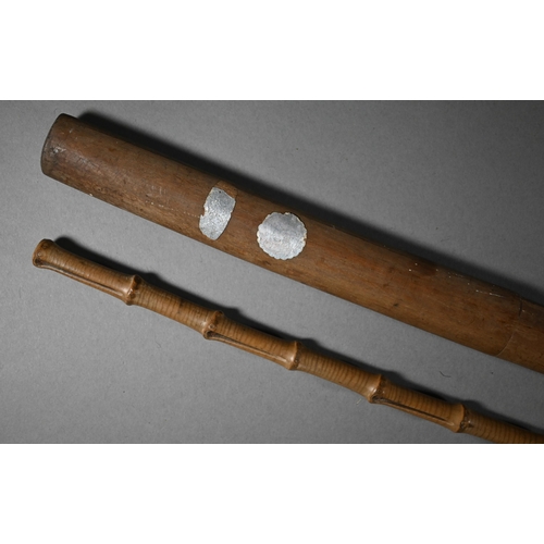 1128 - A Japanese Bokken (wooden practice katana sword), 101 cm to/w bamboo swagger stick (2)Purchasers mus... 