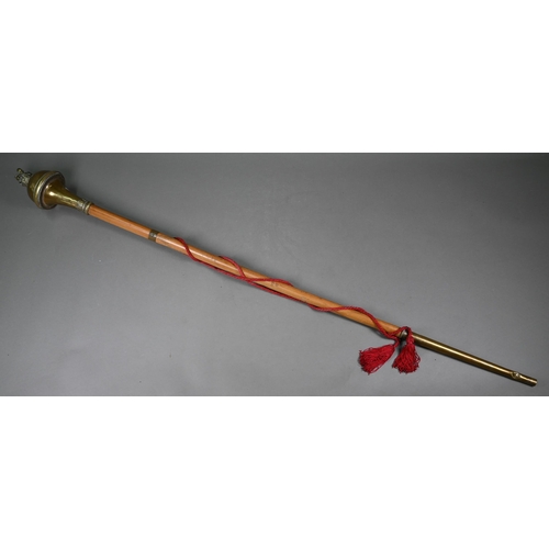 1133 - A Drum Major's mace, the brass top surmounted by a lion and crown pommel, on malacca rod with braide... 