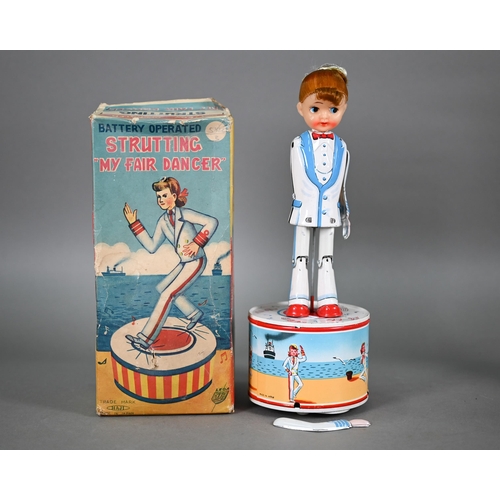 1151 - A boxed Japanese Haji tinplate battery operated 'Strutting My Fair Dancer', 28 cm (one arm f/r), to/... 