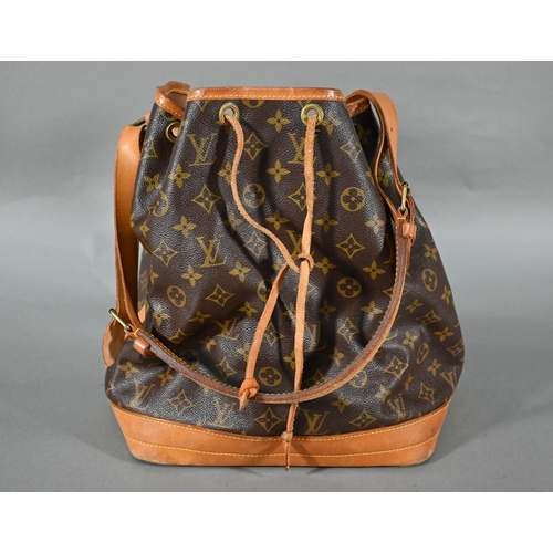 1184 - A Louis Vuitton leather tote bag with drawstring fastening and single strap handle