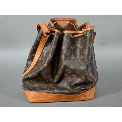 1184 - A Louis Vuitton leather tote bag with drawstring fastening and single strap handle