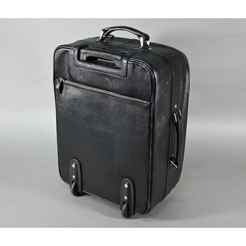 1185 - A Prada carry-on suitcase, with wheels and trolley-handle, nylon and Saffiano leather exterior, full... 