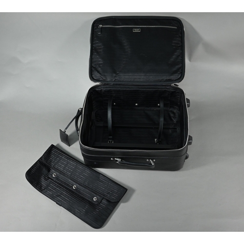 1185 - A Prada carry-on suitcase, with wheels and trolley-handle, nylon and Saffiano leather exterior, full... 