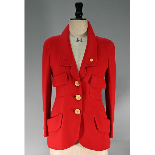 1188 - A Chanel Boutique jacket in red wool, long line with double collar, single breasted with four open p... 