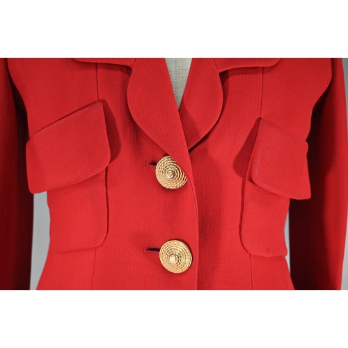 1188 - A Chanel Boutique jacket in red wool, long line with double collar, single breasted with four open p... 